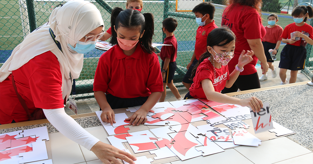 Students participating in a hands-on learning activity with parent support.
